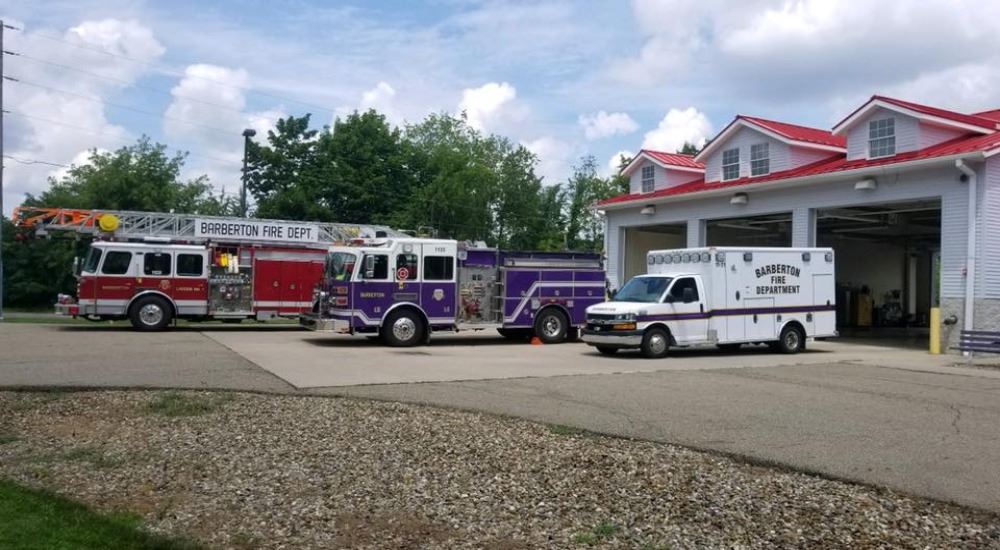 station-trucks-new Street lined with a theater and other businesses